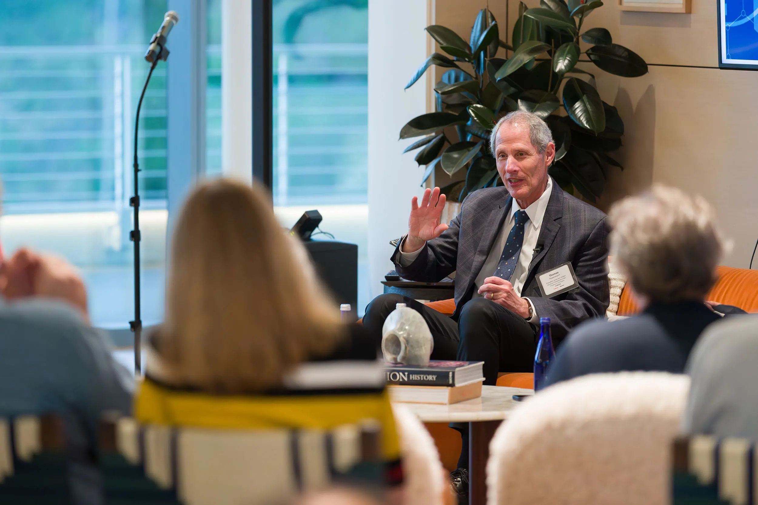 Caltech President Thomas Rosenbaum speaking at the alumni event